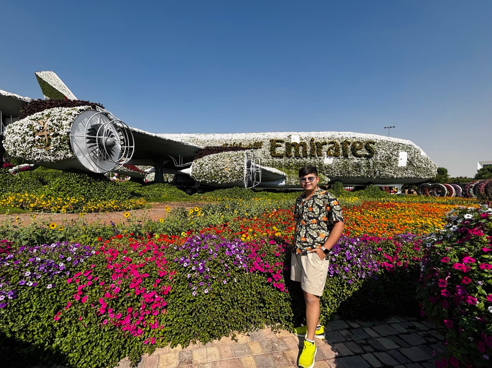 Meet Jariwala in front of the Emirates floral aeroplane at Dubai Miracle Garden
